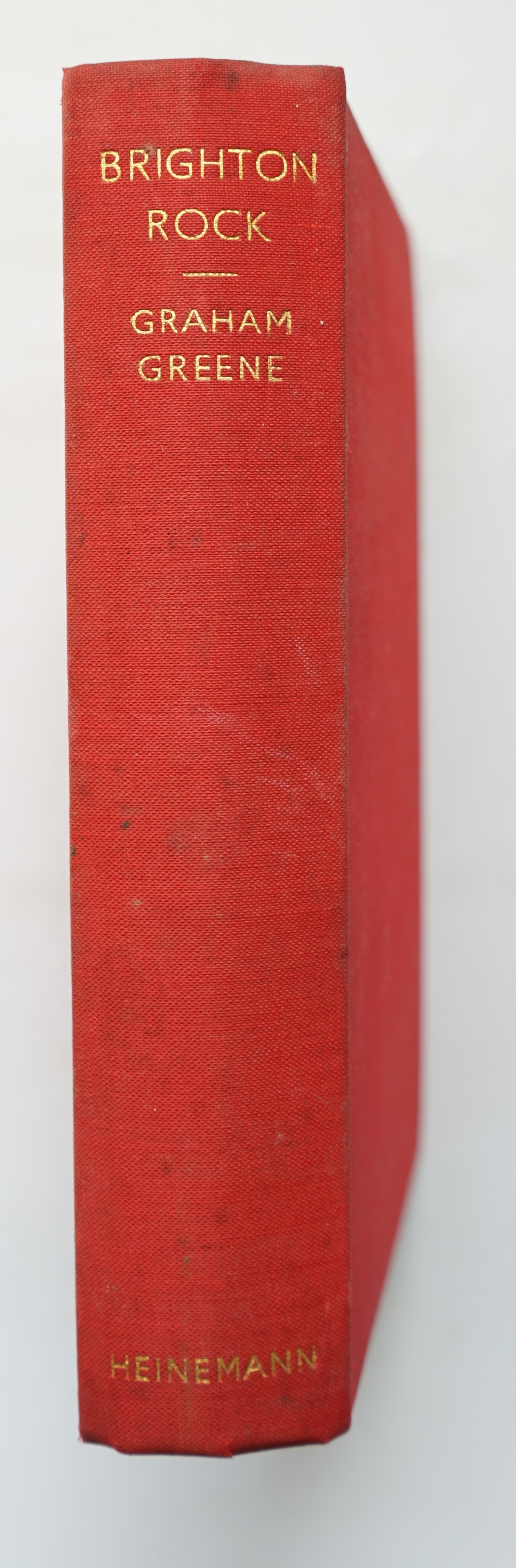 Greene, Graham - Brighton Rock, 1st English edition, 8vo, original red cloth, with some toning to margins and endpapers, (as often), closed tear to margin of pp, 343 and 359, William Heinemann Ltd., London, 1938.